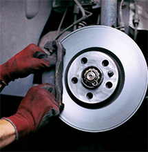 An ad for 10% off coupons for Premium Brake Pad and Rotor Replacement in Seminole