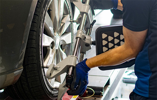 A tire being replaced at a shop for auto repair in Seminole