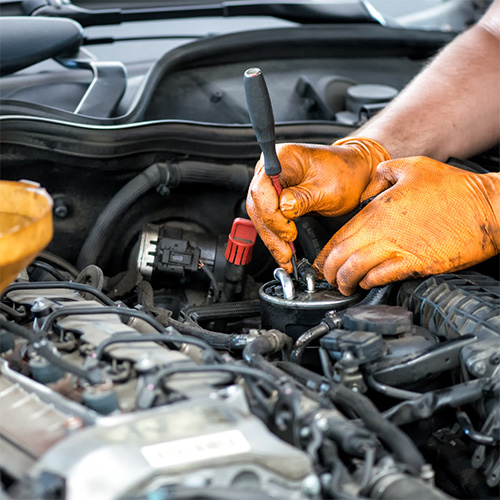 Routine tune-up inside a car in Seminole