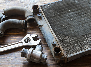 Tools lie on a table for cooling system services performed in Seminole